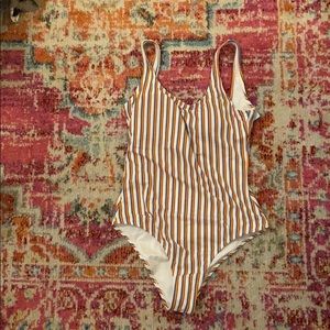 Orange and blue striped one-piece bathing suit
